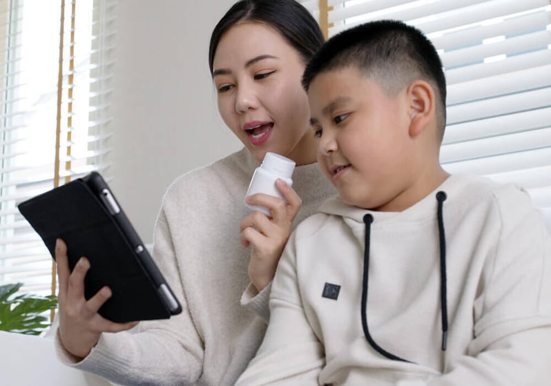 Mother-and-son-using-tablet